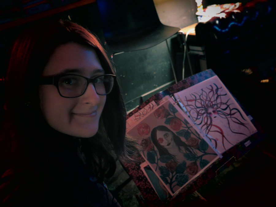 Sarah with her portfolio.