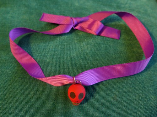Skull and ribbon necklace